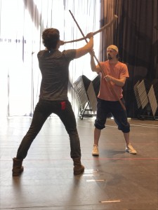 Robin and Little John, battling with quarterstaffs