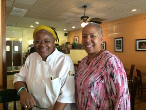 Stephanie Tyson, left, and Vivián Joyner, right, in the front room of Sweet Potatoes. 